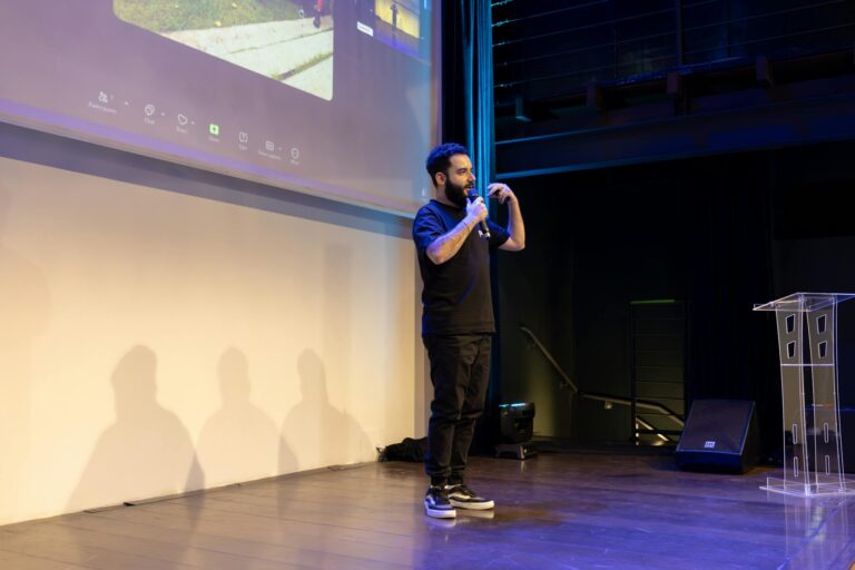 Energetic speaker delivering a talk at a corporate event